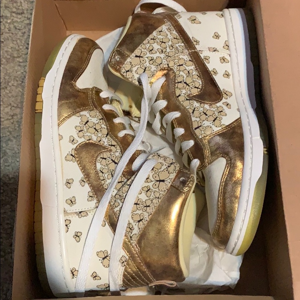 Nike gold and white Air Force ones